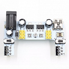 Модуль питания для макетной платы MB-102, белый, вх.12В вых.5В, 3.3В 0,7А (KZY0026-1), Китай